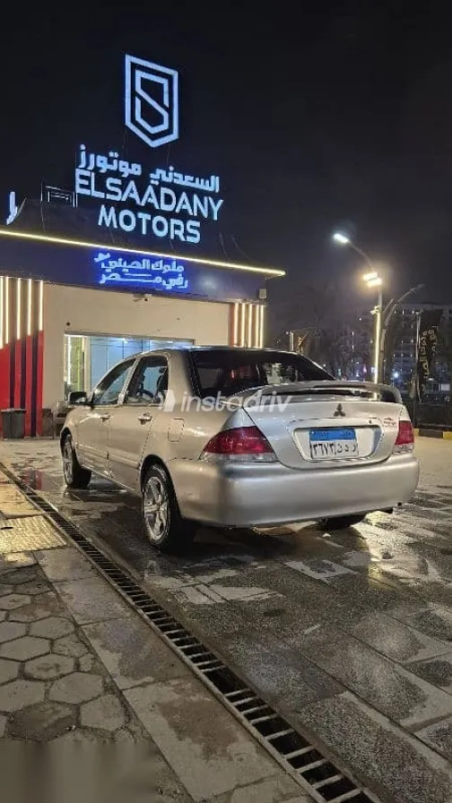 ميتسوبيشي لانسر 2012 ذهبي مستعملة للبيع - 4