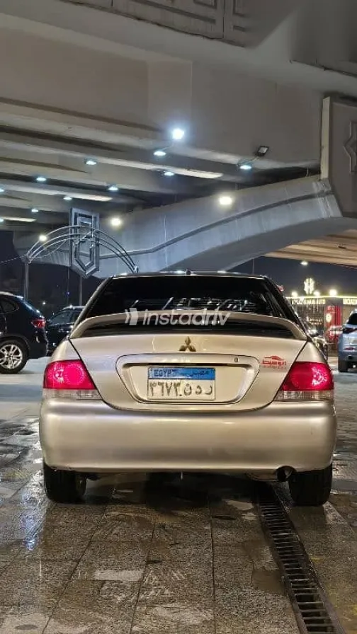 ميتسوبيشي لانسر 2012 ذهبي مستعملة للبيع - 6