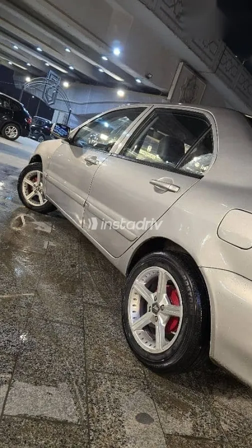 ميتسوبيشي لانسر 2012 ذهبي مستعملة للبيع - 7