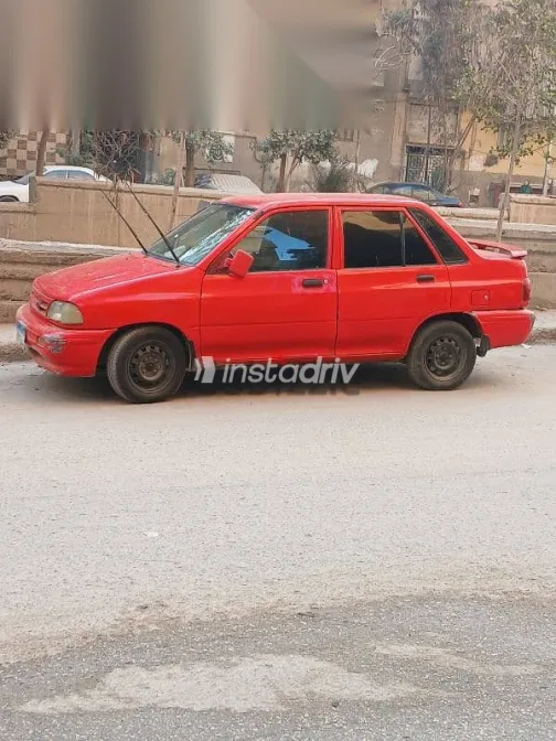 كيا برايد 2002 أحمر مستعملة للبيع - 1