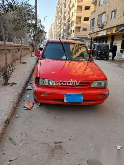 كيا برايد 2002 أحمر مستعملة للبيع - 2