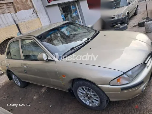 بروتون ويرا 2005 ذهبي مستعملة للبيع - 2