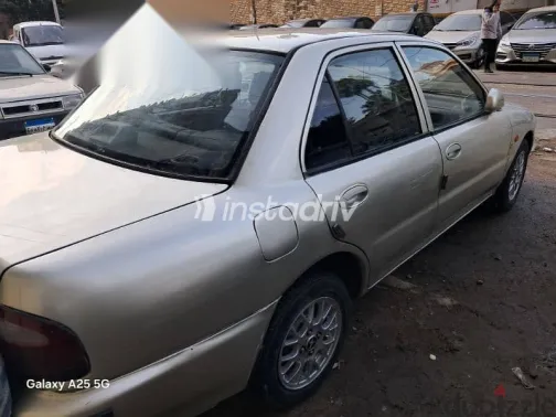 بروتون ويرا 2005 ذهبي مستعملة للبيع - 3