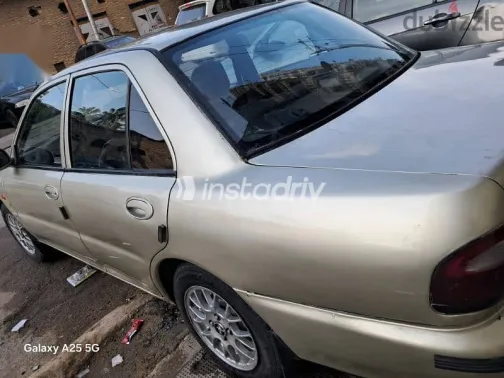 بروتون ويرا 2005 ذهبي مستعملة للبيع - 4