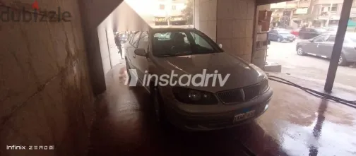 نيسان صنى 2002 فضي مستعملة للبيع - 5