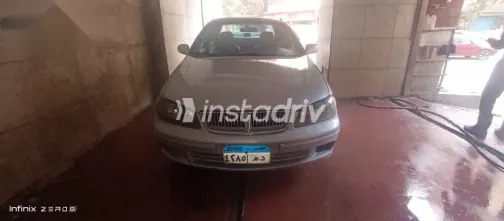 نيسان صنى 2002 فضي مستعملة للبيع - 6