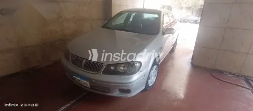 نيسان صنى 2002 فضي مستعملة للبيع - 7