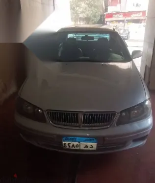 نيسان صنى 2002 فضي مستعملة للبيع