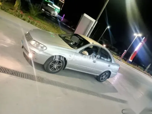 نيسان صنى 2008 فضي مستعملة للبيع - 4