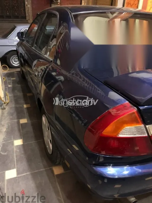 ميتسوبيشي لانسر 2000 أزرق غامق مستعملة للبيع - 6