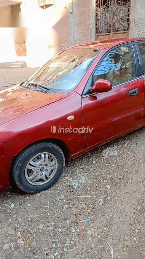 دايو لانوس 1999 أحمر مستعملة للبيع - 1