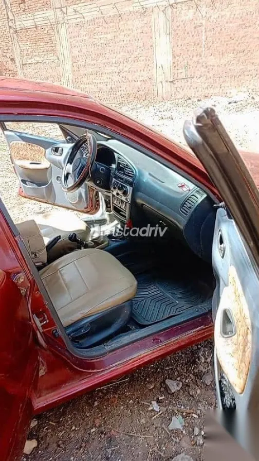 دايو لانوس 1999 أحمر مستعملة للبيع - 9