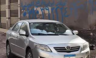 تويوتا كورولا 2008 فضي مستعملة للبيع