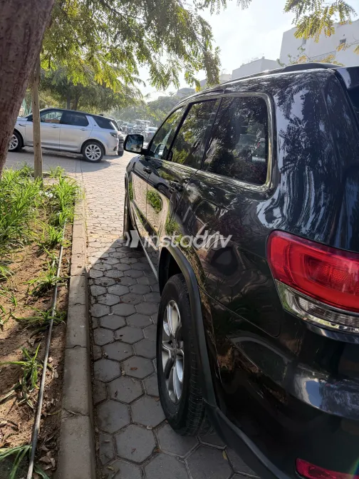 جيب جراند شيروكي 2015 أبيض مستعملة للبيع - 1