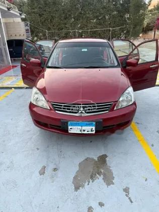 Mitsubishi Lancer Puma 2011 Dark Red Used for Sale