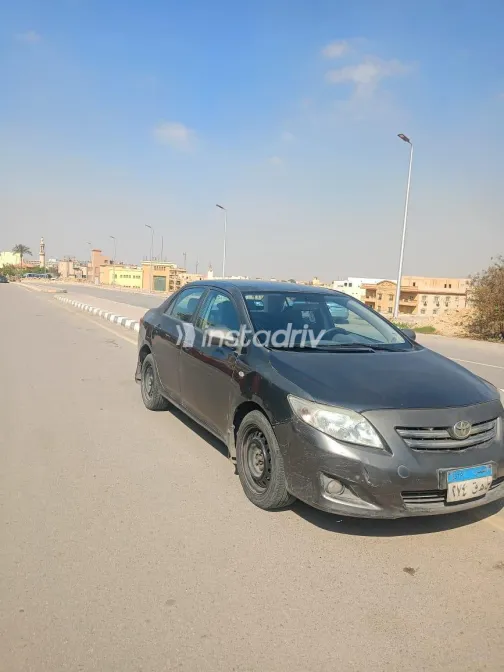 تويوتا كورولا 2010 أبيض مستعملة للبيع - 6