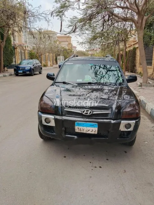 هيونداي توسان 2009 أسود مستعملة للبيع - 1