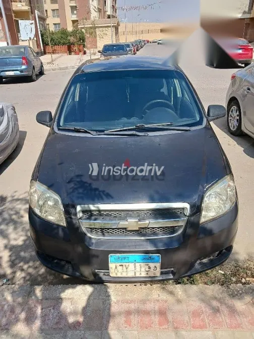 شيفروليه افيو 2009 أسود مستعملة للبيع - 1
