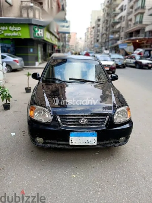 هيونداي فيرنا 2005 أسود مستعملة للبيع - 1