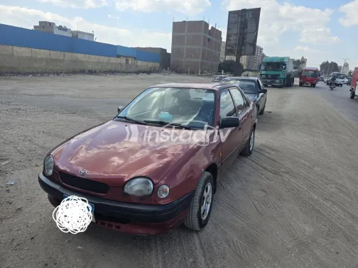 تويوتا كورولا 1999 أحمر غامق مستعملة للبيع - 2