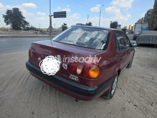 تويوتا كورولا 1999 أحمر غامق مستعملة للبيع - 3