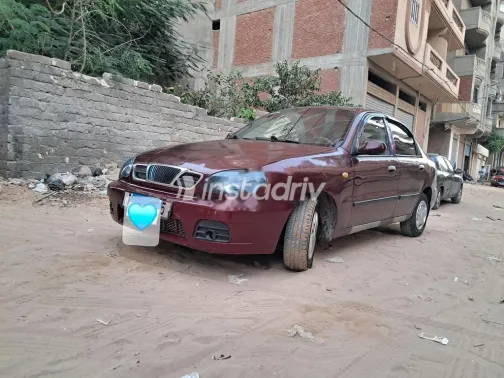 شيفروليه لانوس 2012 أحمر غامق مستعملة للبيع - 1