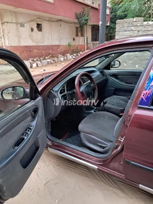 شيفروليه لانوس 2012 أحمر غامق مستعملة للبيع - 4