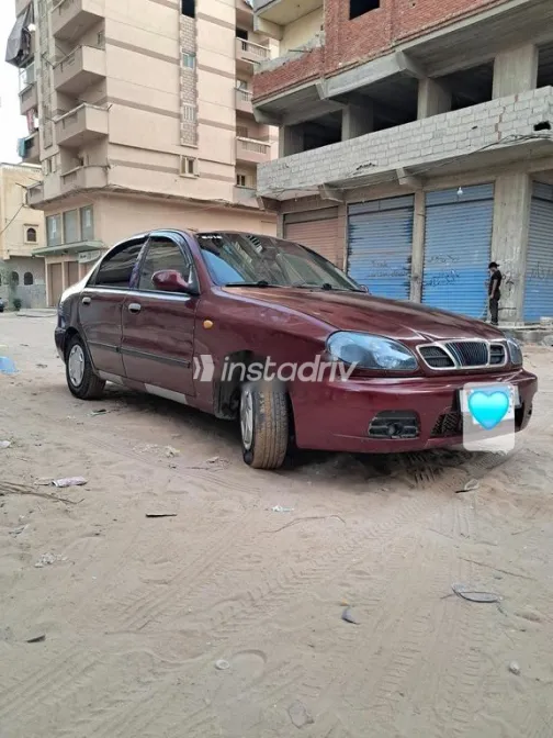 شيفروليه لانوس 2012 أحمر غامق مستعملة للبيع - 5