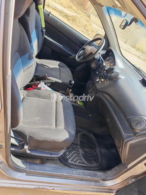 شيفروليه افيو 2014 أبيض مستعملة للبيع - 5