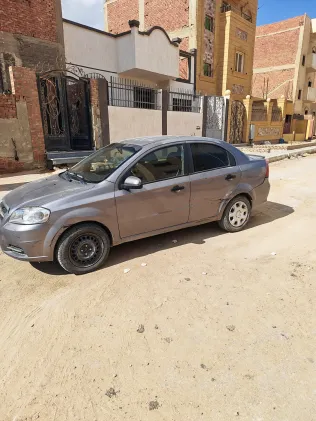 شيفروليه افيو 2014 أبيض مستعملة للبيع