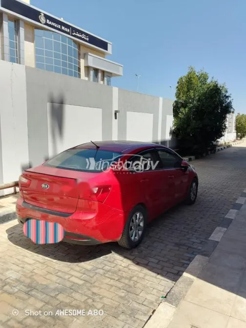 كيا ريو 2013 أحمر مستعملة للبيع - 1