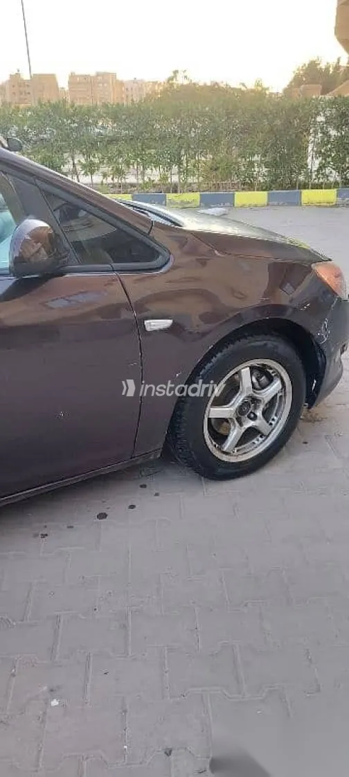 اوبل أسترا 2013 بني مستعملة للبيع - 1