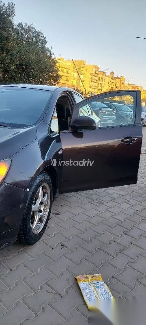 اوبل أسترا 2013 بني مستعملة للبيع - 7