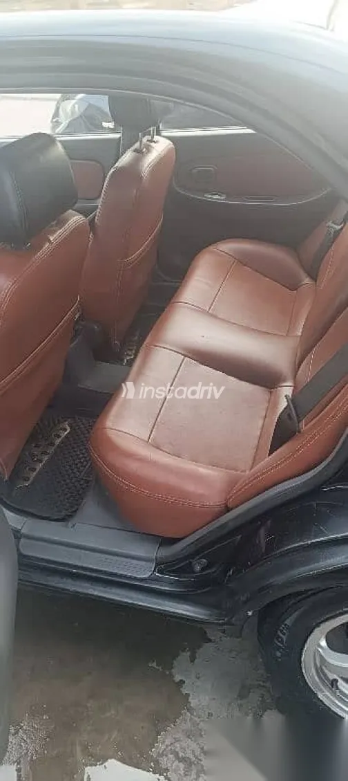 كيا سبكترا 2001 أسود مستعملة للبيع - 3