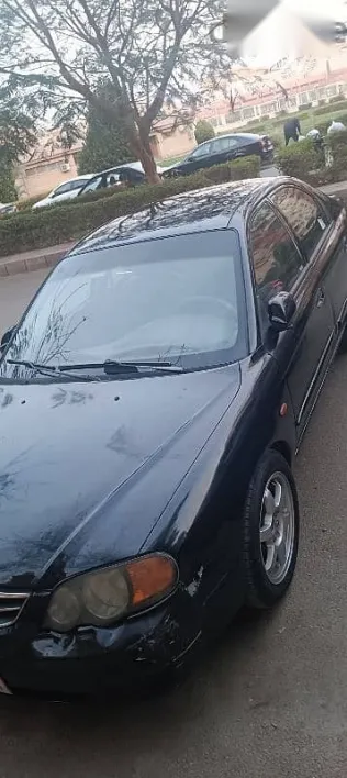 كيا سبكترا 2001 أسود مستعملة للبيع