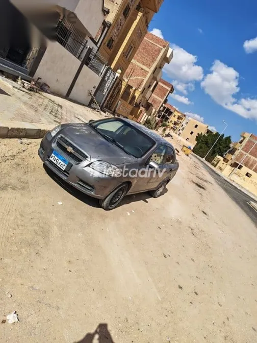 شيفروليه افيو 2014 رمادي مستعملة للبيع - 2