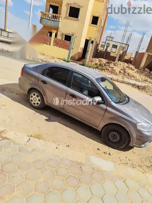 شيفروليه افيو 2014 رمادي مستعملة للبيع - 4