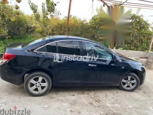 شيفروليه كروز 2011 أسود مستعملة للبيع - 5