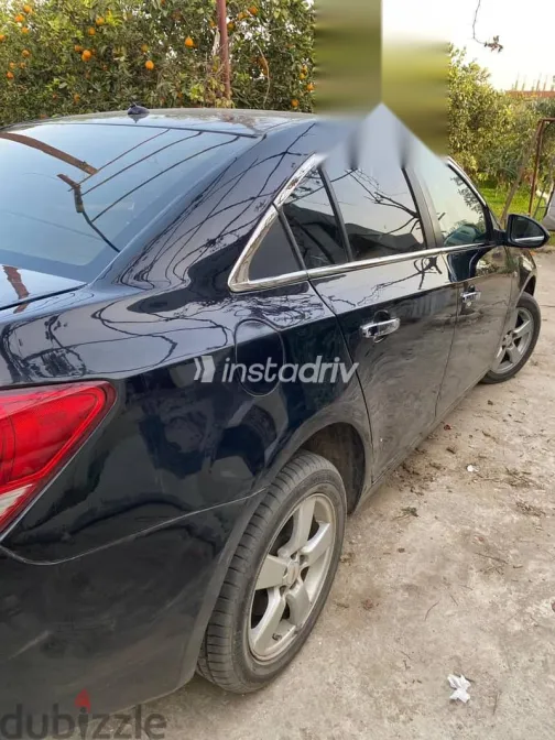 شيفروليه كروز 2011 أسود مستعملة للبيع - 7