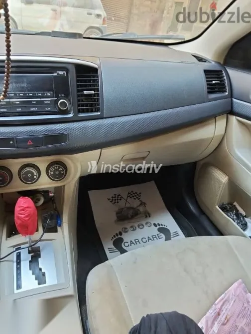 ميتسوبيشي لانسر 2016 أحمر مستعملة للبيع - 6