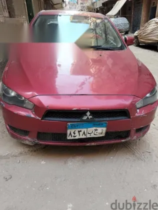 ميتسوبيشي لانسر 2016 أحمر مستعملة للبيع