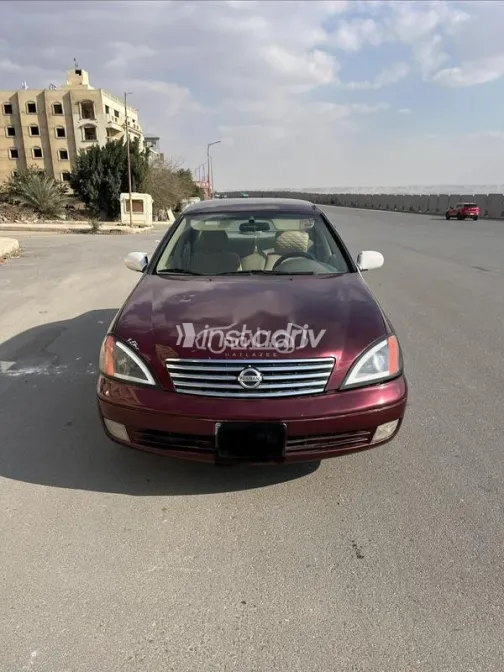 نيسان صنى 2015 أحمر غامق مستعملة للبيع - 1