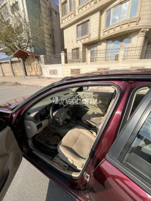 نيسان صنى 2015 أحمر غامق مستعملة للبيع - 4