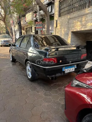 بيجو 405 1993 أخضر غامق مستعملة للبيع