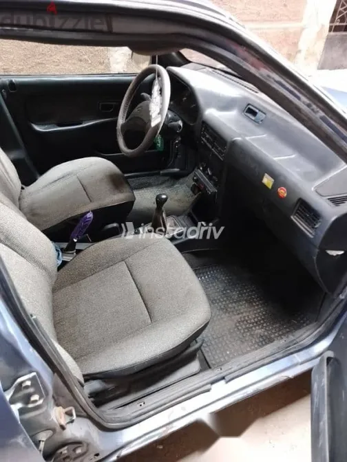 هيونداي اكسيل 1995 أزرق غامق مستعملة للبيع - 9