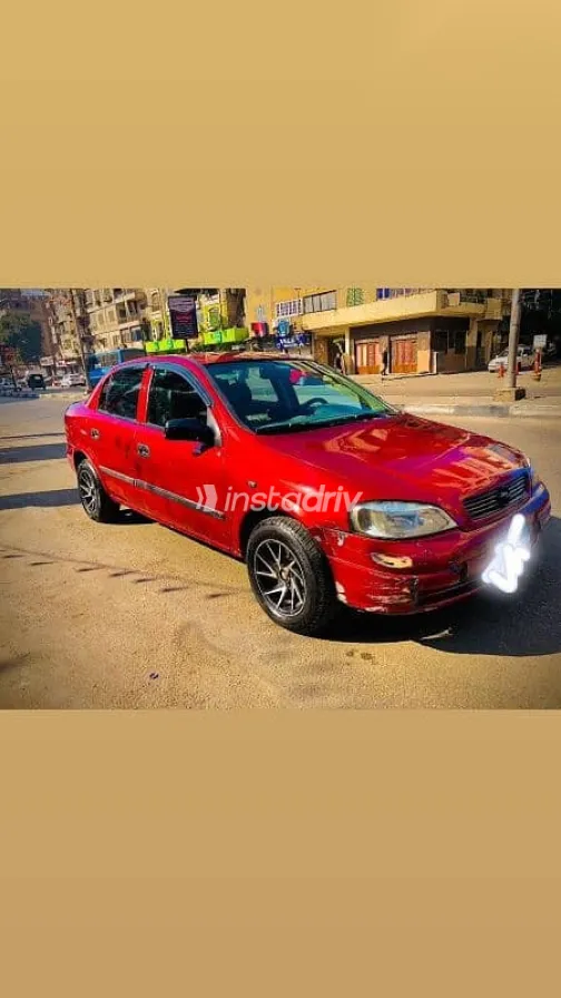 اوبل أسترا 2000 أحمر مستعملة للبيع - 1