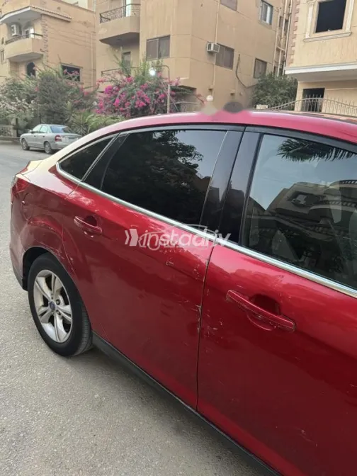 فورد فوكس 2014 أحمر غامق مستعملة للبيع - 4