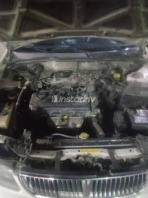 نيسان صنى 2001 أبيض مستعملة للبيع - 8