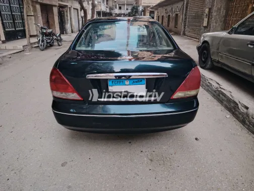 نيسان صنى 2006 أبيض مستعملة للبيع - 1