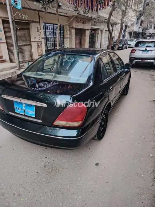 نيسان صنى 2006 أبيض مستعملة للبيع - 6